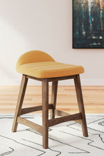 Lyncott Upholstered Barstool (2/CN) Mustard/Brown