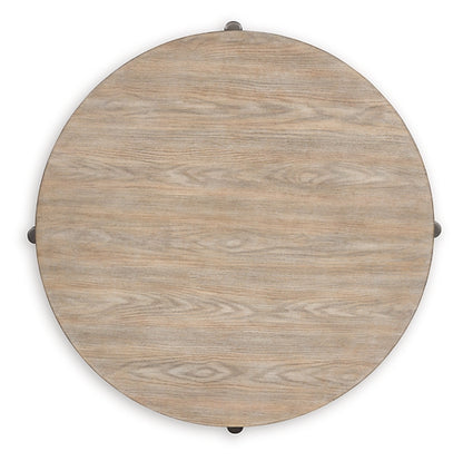 Dyonton Round Cocktail Table