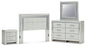 Zyniden Queen Upholstered Panel Headboard with Mirrored Dresser and Nightstand