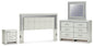 Zyniden King Upholstered Panel Headboard with Mirrored Dresser and Nightstand