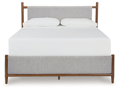 Lyncott Queen Upholstered Bed with Mirrored Dresser and Chest