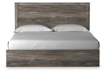Ralinksi King Panel Bed with Mirrored Dresser, Chest and Nightstand