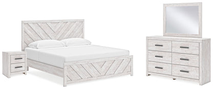 Cayboni King Panel Bed with Mirrored Dresser and Nightstand