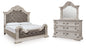 Bruchandi King Upholstered Panel Bed with Mirrored Dresser